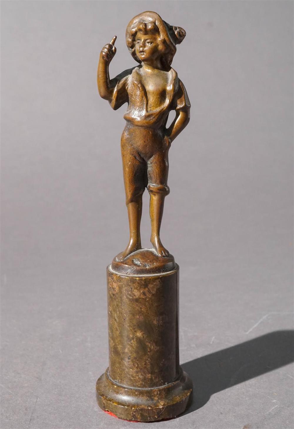 BRONZE FIGURE OF YOUNG BOY ON