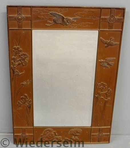 Bronze framed Asian mirror with
