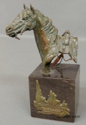 Bronze horse head mounted on a