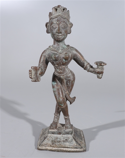 Bronze Indian statue featuring a