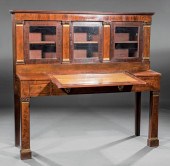 BRONZE-MOUNTED CARVED MAHOGANY