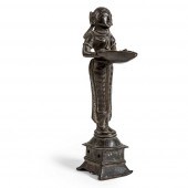 BRONZE OIL LAMP IN THE FORM OF