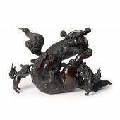 BRONZE OKIMONO OF SHISHI WITH