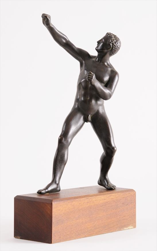 BRONZE-PATINATED FIGURE OF A