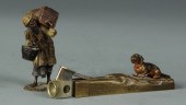 Bronze Peddler & Cigar Cutter