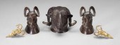 Bronze rams&#39; heads: pair r