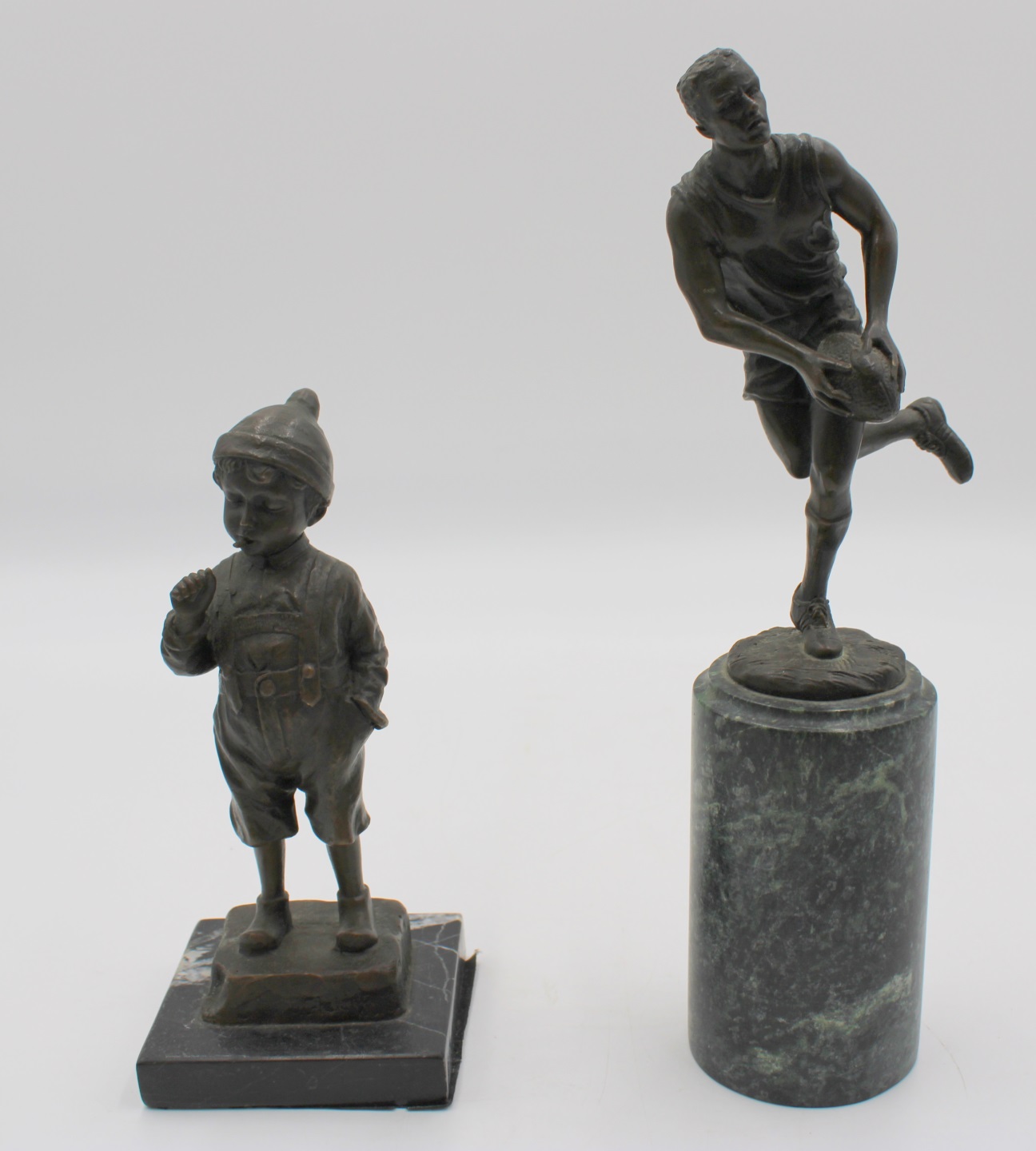 BRONZE RUGBY PLAYER AND A BRONZE