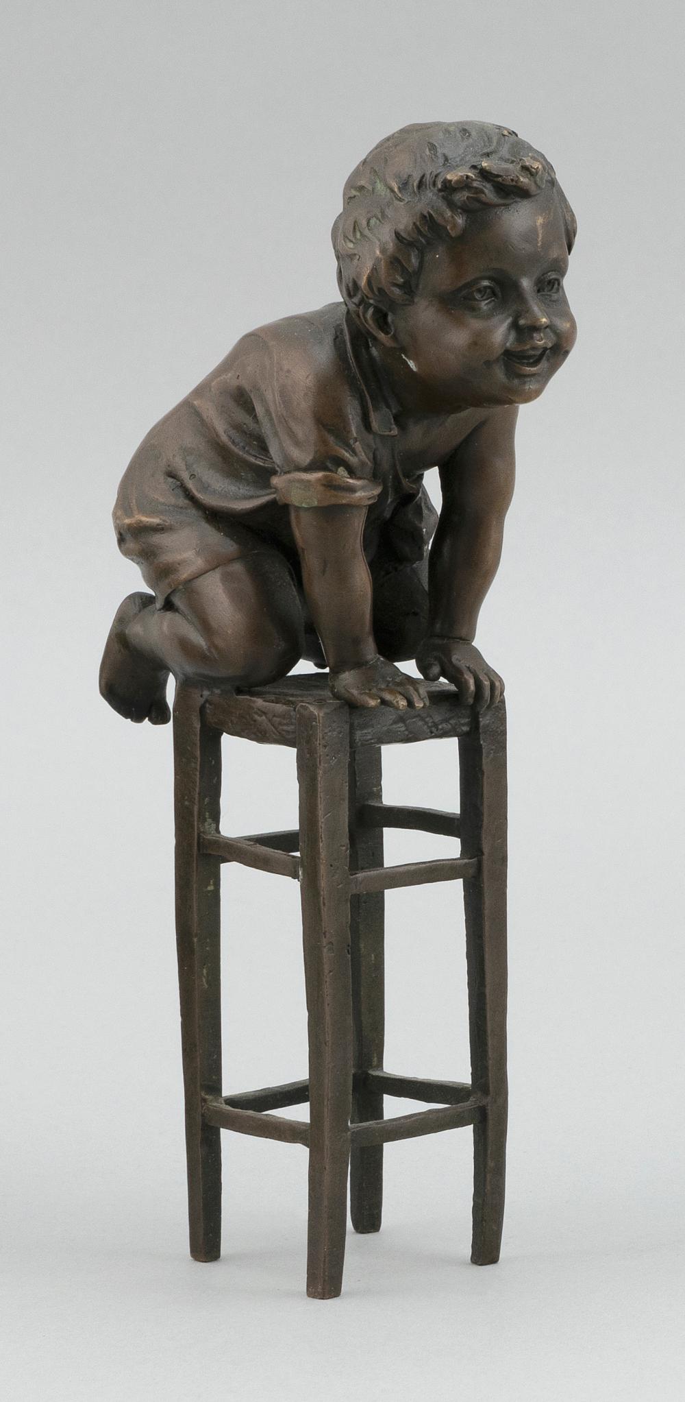 BRONZE SCULPTURE OF A BOY