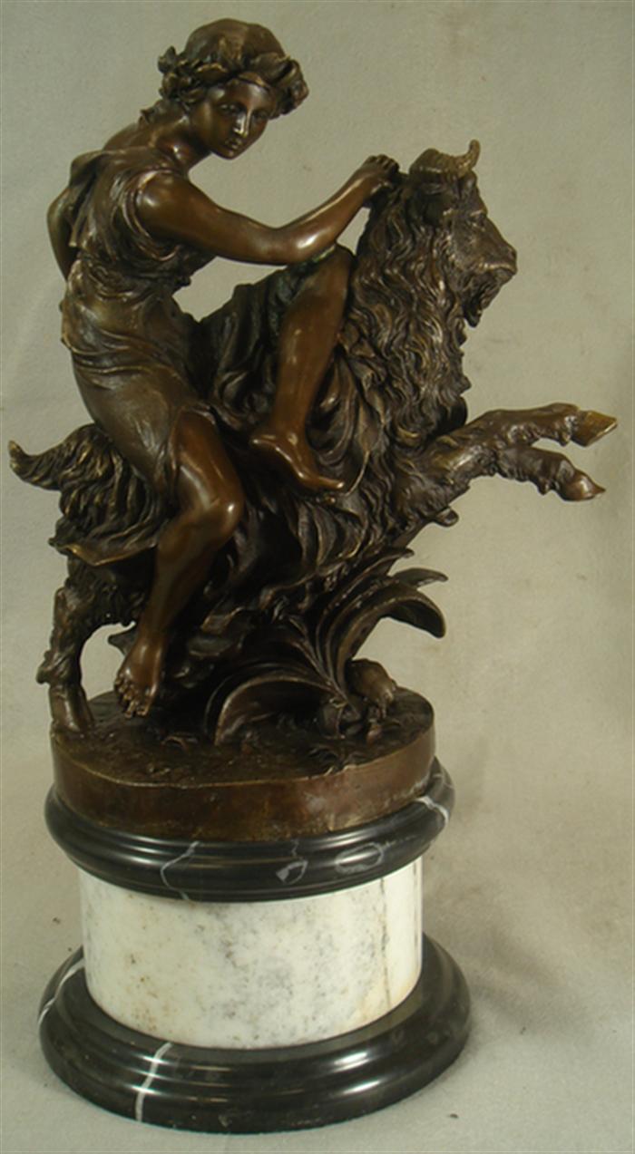 Bronze sculpture of a nude on a