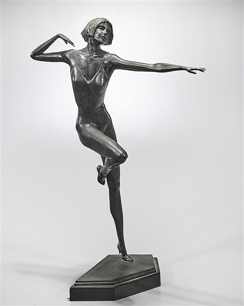 Bronze sculpture of a woman dancer,