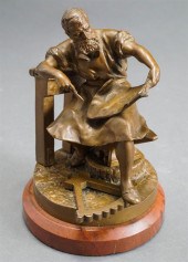 BRONZE SCULPTURE OF AN ENGINEE
