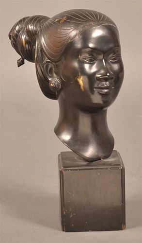 BRONZE SCULPTURE OF AN INDONESIAN