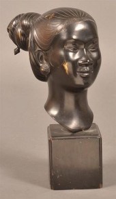 BRONZE SCULPTURE OF AN INDONES