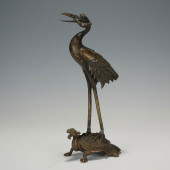 BRONZE SCULPTURE OF CRANE ON T