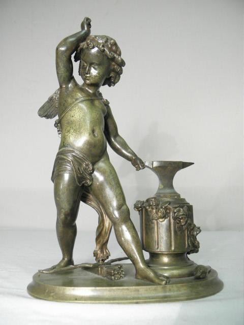 Bronze sculpture of cupid & an
