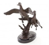 Bronze sculpture of rising duc