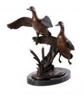Bronze sculpture of rising duc