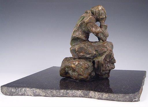 BRONZE SEATED FIGURE WITH HEAD IN
