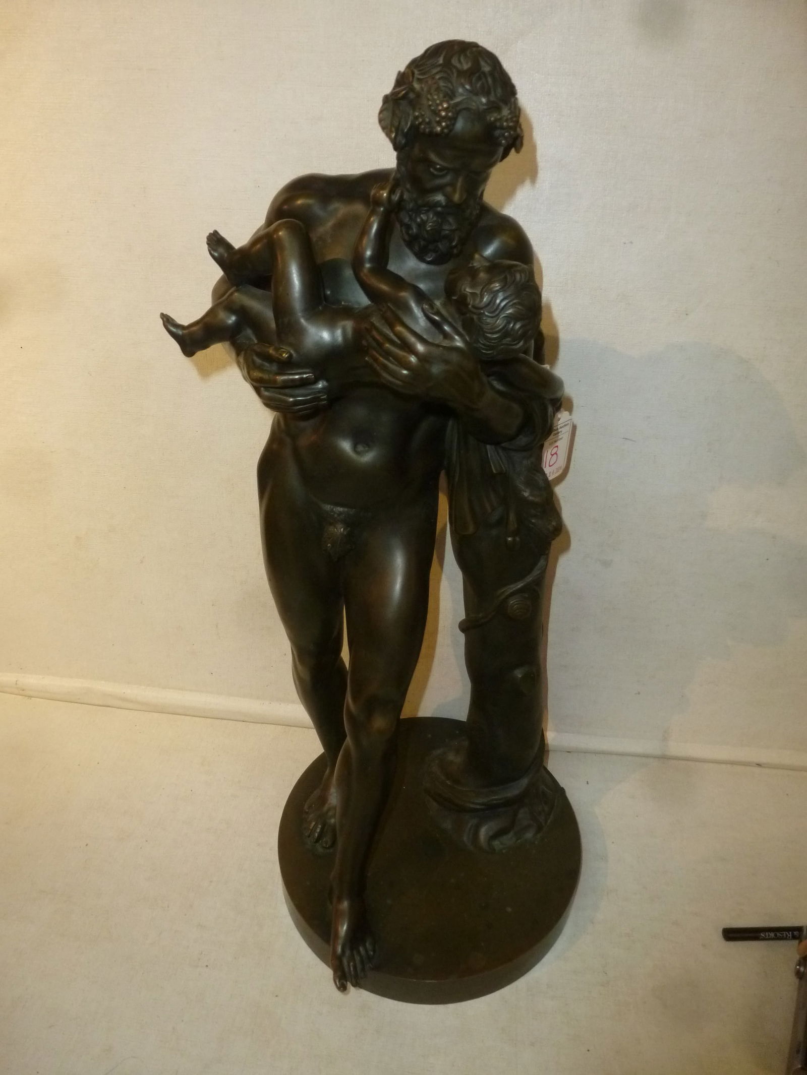 BRONZE STATUE OF SILENUS CARRYING
