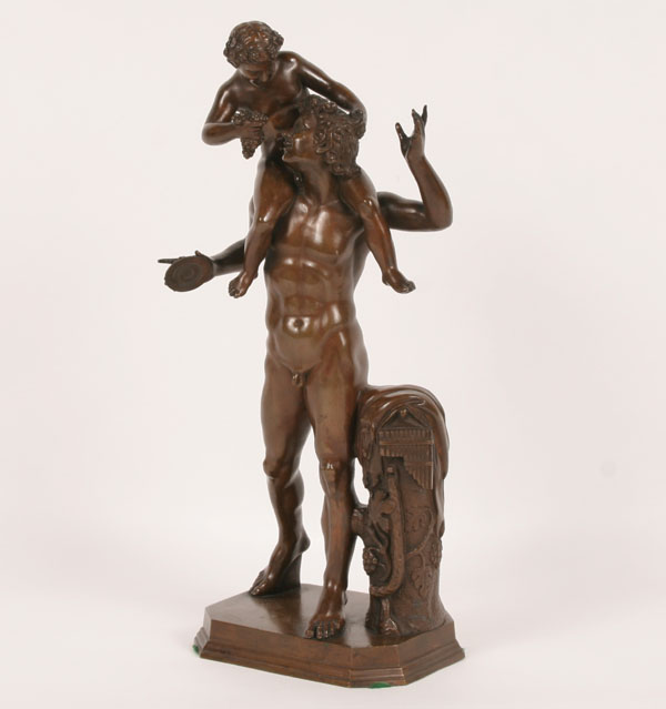 Bronze statue of Silenus holding an