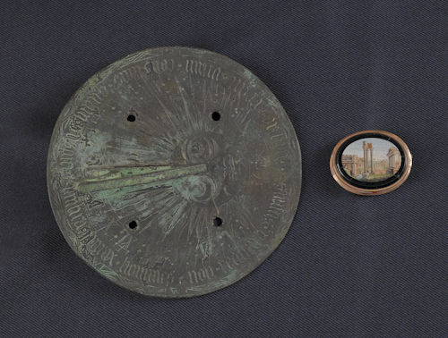 Bronze sundial together with an