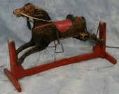 Brown felt covered gliding hor