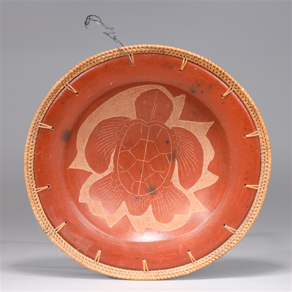 Brown glazed ceramic dish with