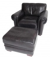 BROWN LEATHER CHAIR AND OTTOMA