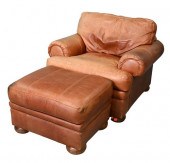 BROWN LEATHER EASY CHAIR AND O