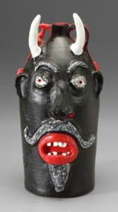 Brown Pottery double devil jug