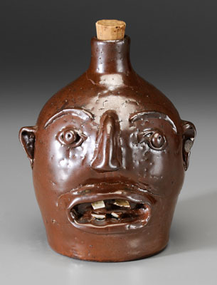 Brown Pottery Face Jug Buncombe