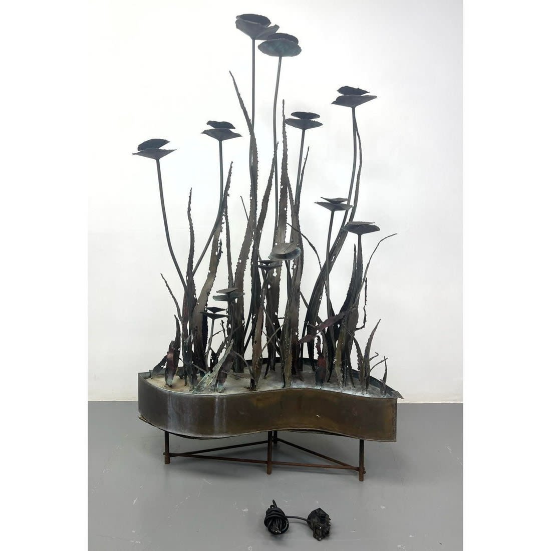 Brutalist Mixed Metal Water