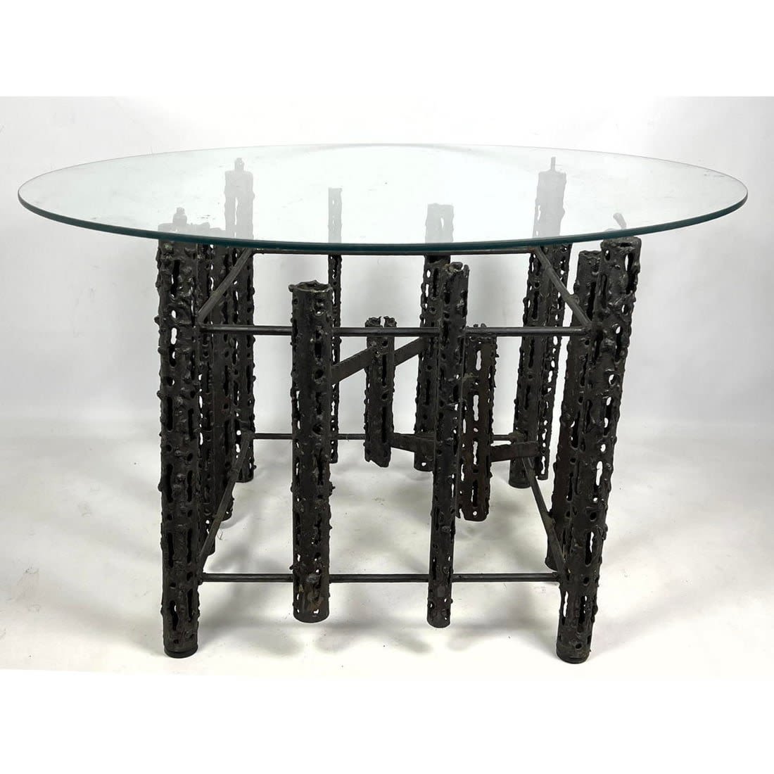 Brutalist steel round end table.