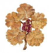 BUCCELLATI 18KT. RUBY BROOCHle
