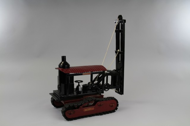 BUDDY 'L' PILE DRIVER ON TREADS