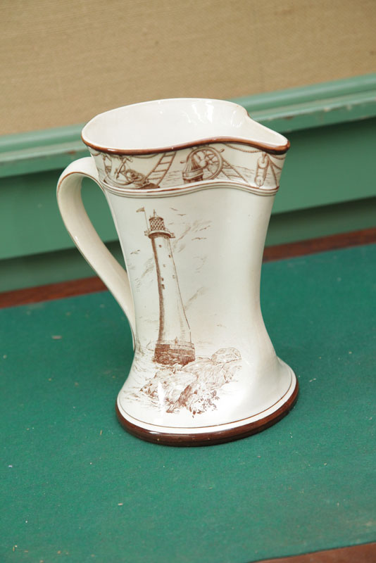 BUFFALO POTTERY PITCHER. Brown