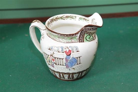 BUFFALO POTTERY PITCHER. Polychrome