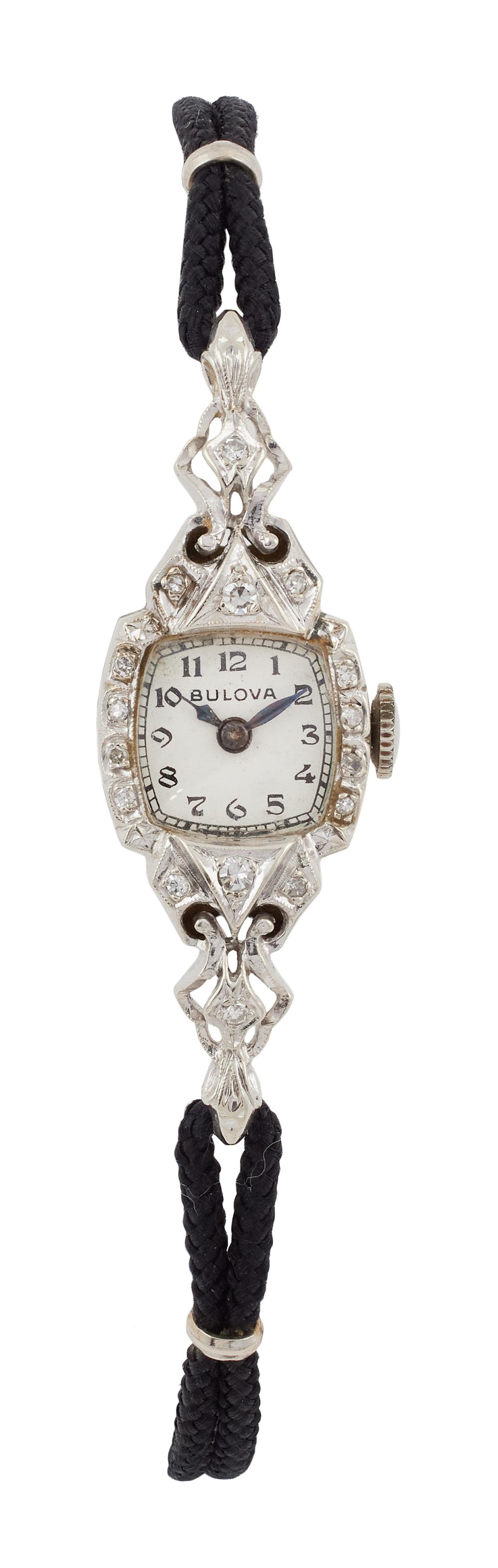 BULOVA 14KT WHITE GOLD AND