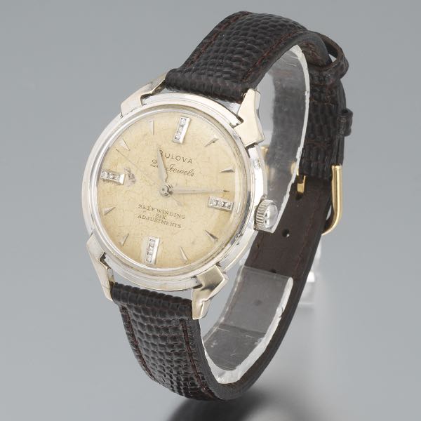 BULOVA AUTOMATIC 14K CASE 33mm head