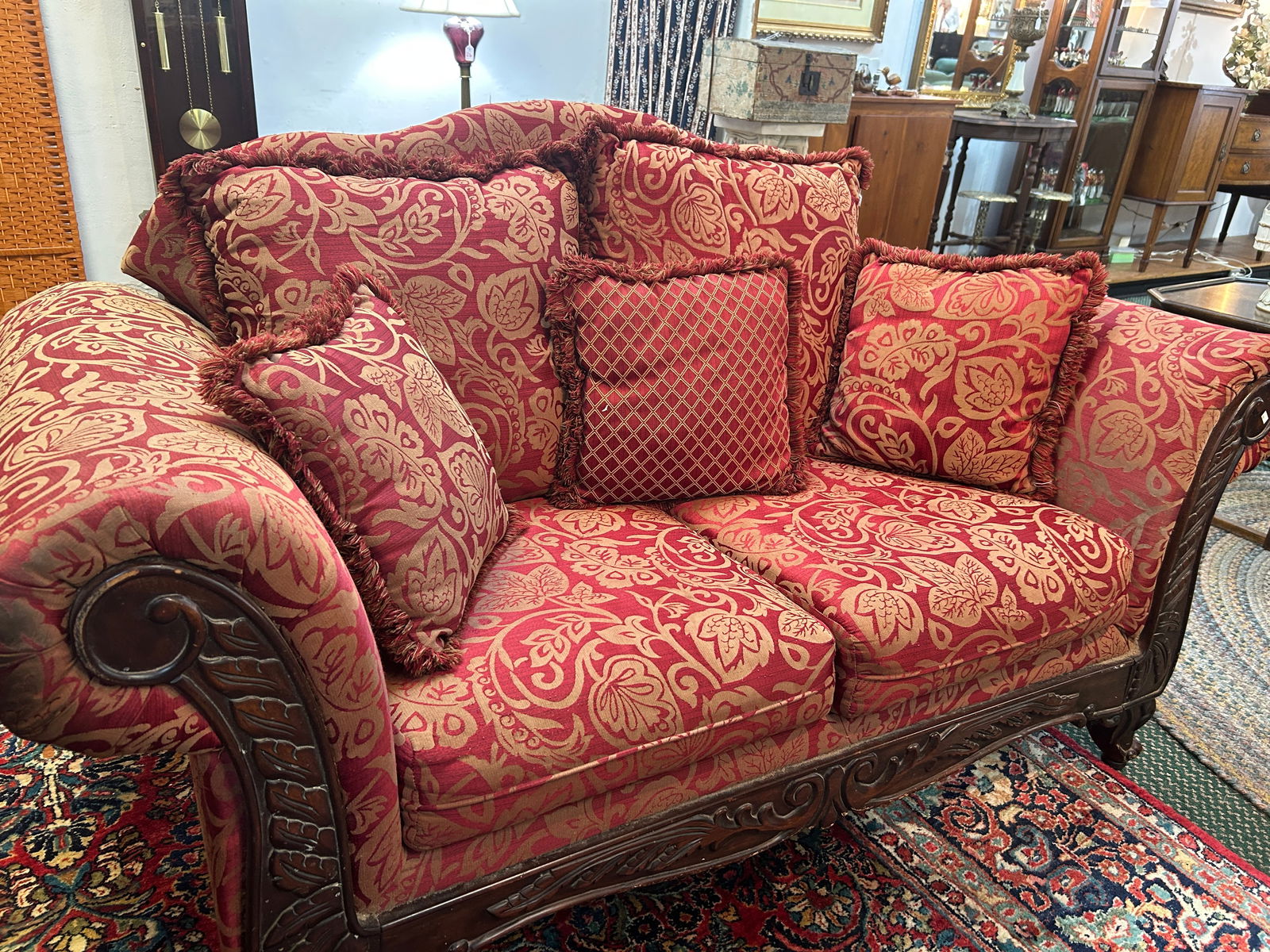 BURGUNDY AND TAN LOVE SEAT WITH