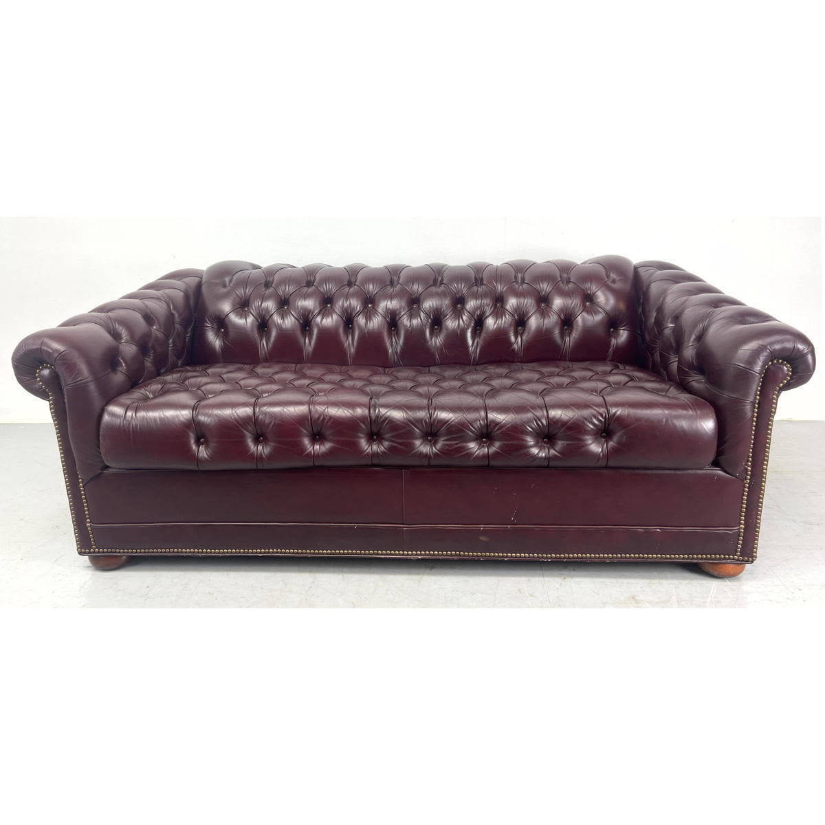 Burgundy leather Chesterfield