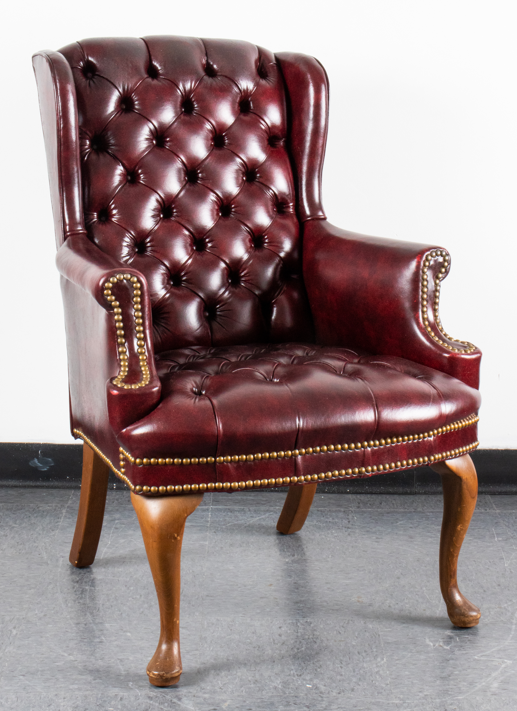 BURGUNDY TUFTED VINYL WING BACK