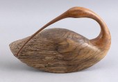 BURLWOOD CARVING OF A PREENING