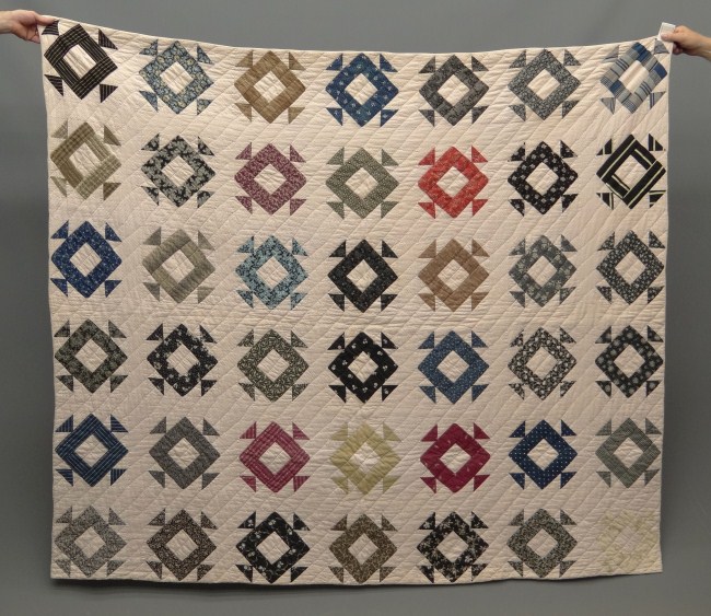 C. 1900 mosaic quilt. 66 1/2'' x