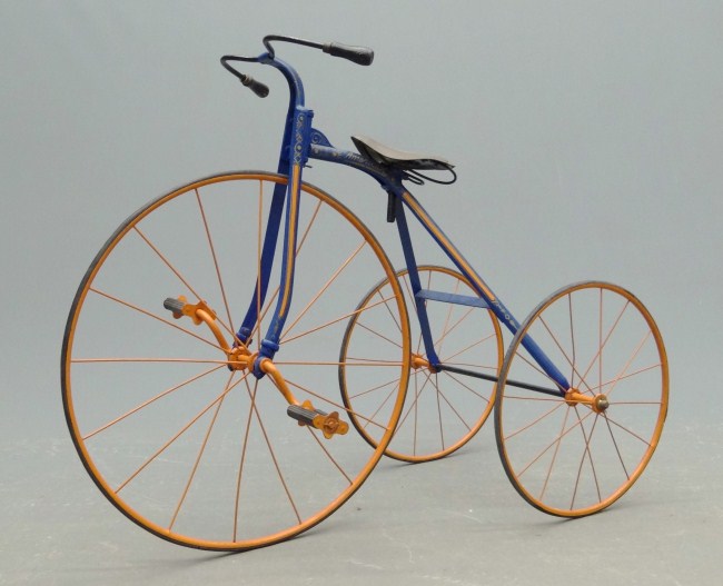 C. 1900 strap steel tricycle.