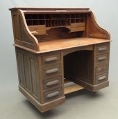 C. 1900's oak rolltop desk. 49