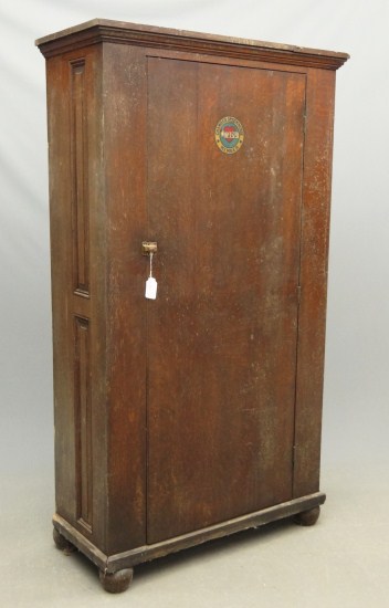 C. 1900's oak two door cupboard.