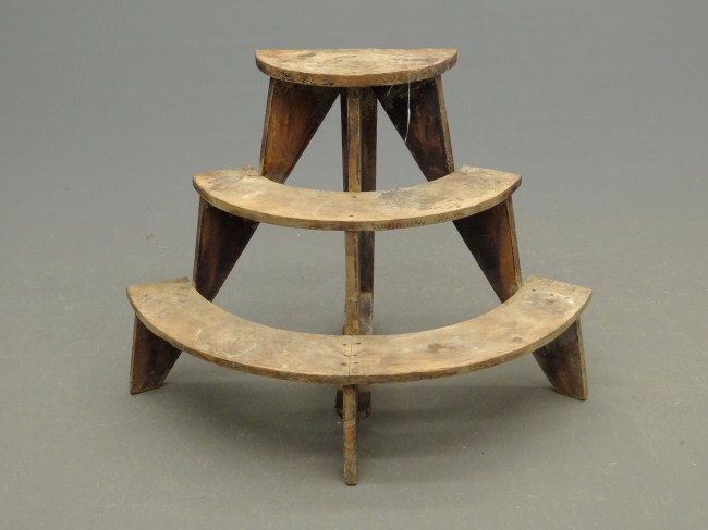 C. 1900's three tiered plant stand.