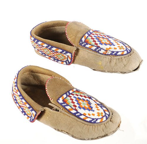 C. 1950- METIS CREE BEADED HIDE