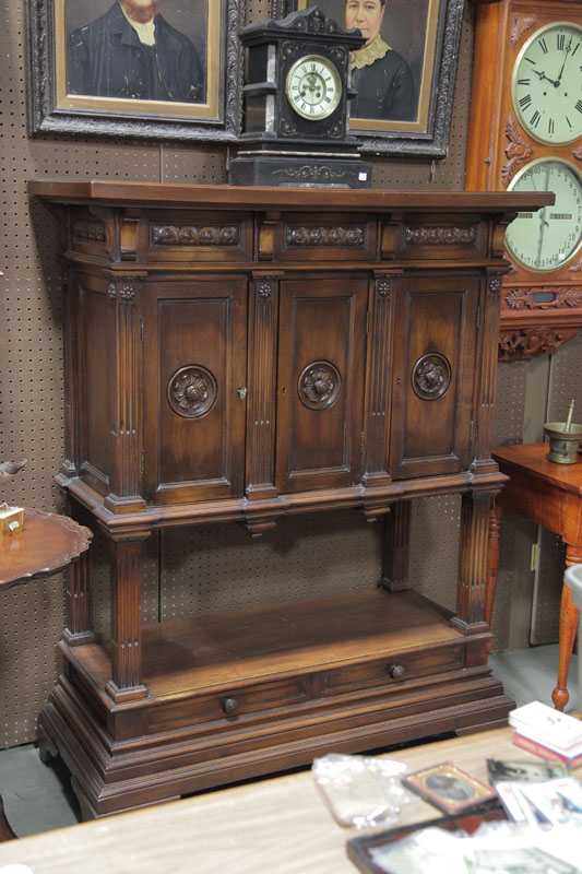CABINET. Walnut having three